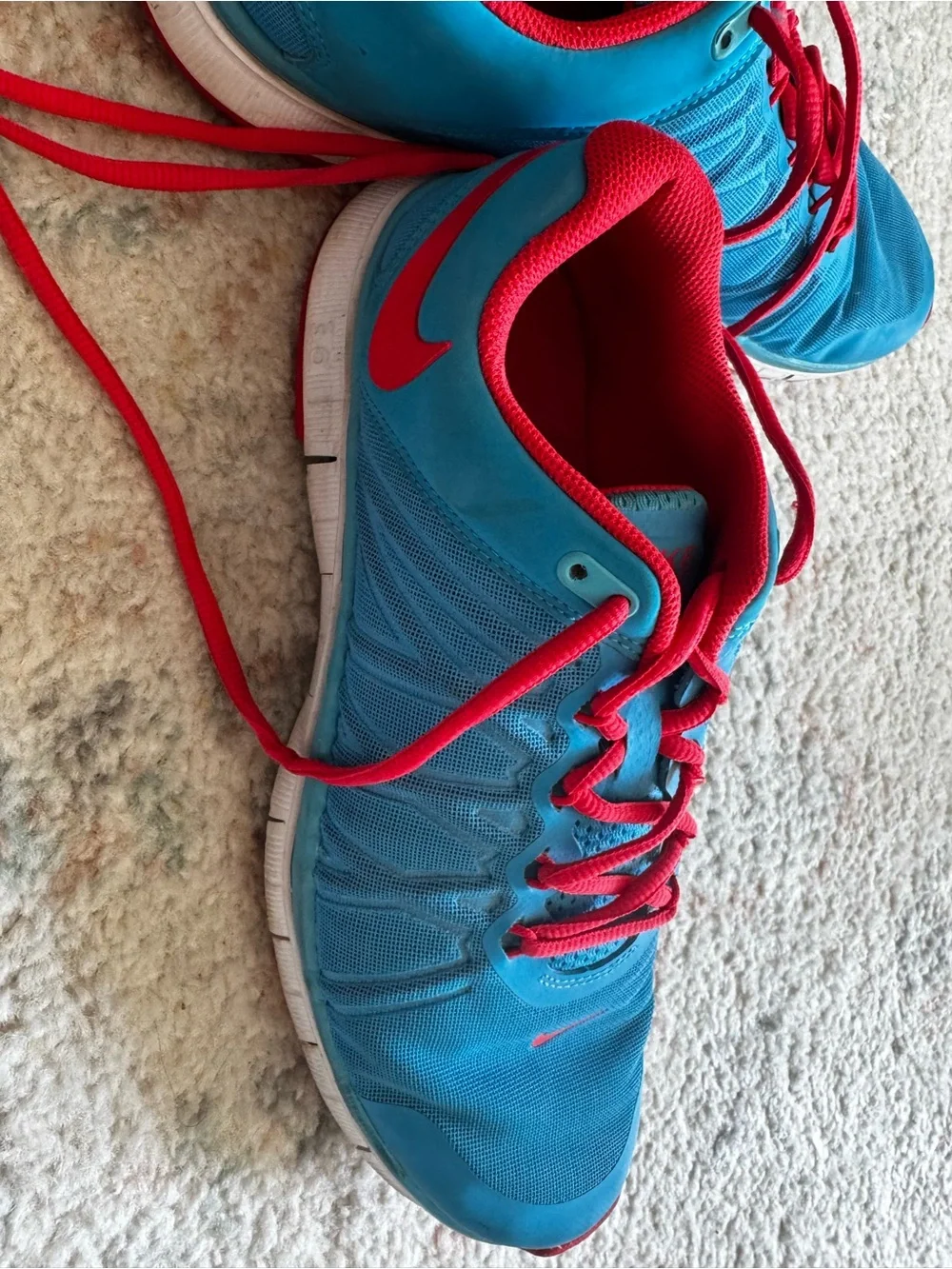 Nike Blue Athletic Shoes with Red Laces
